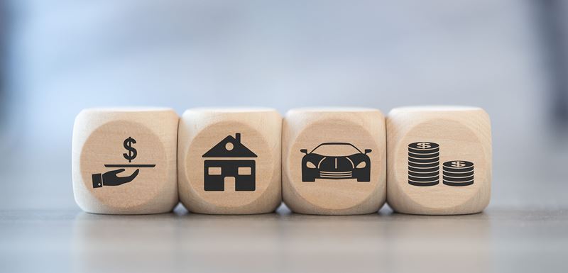 wooden blocks with loan icons